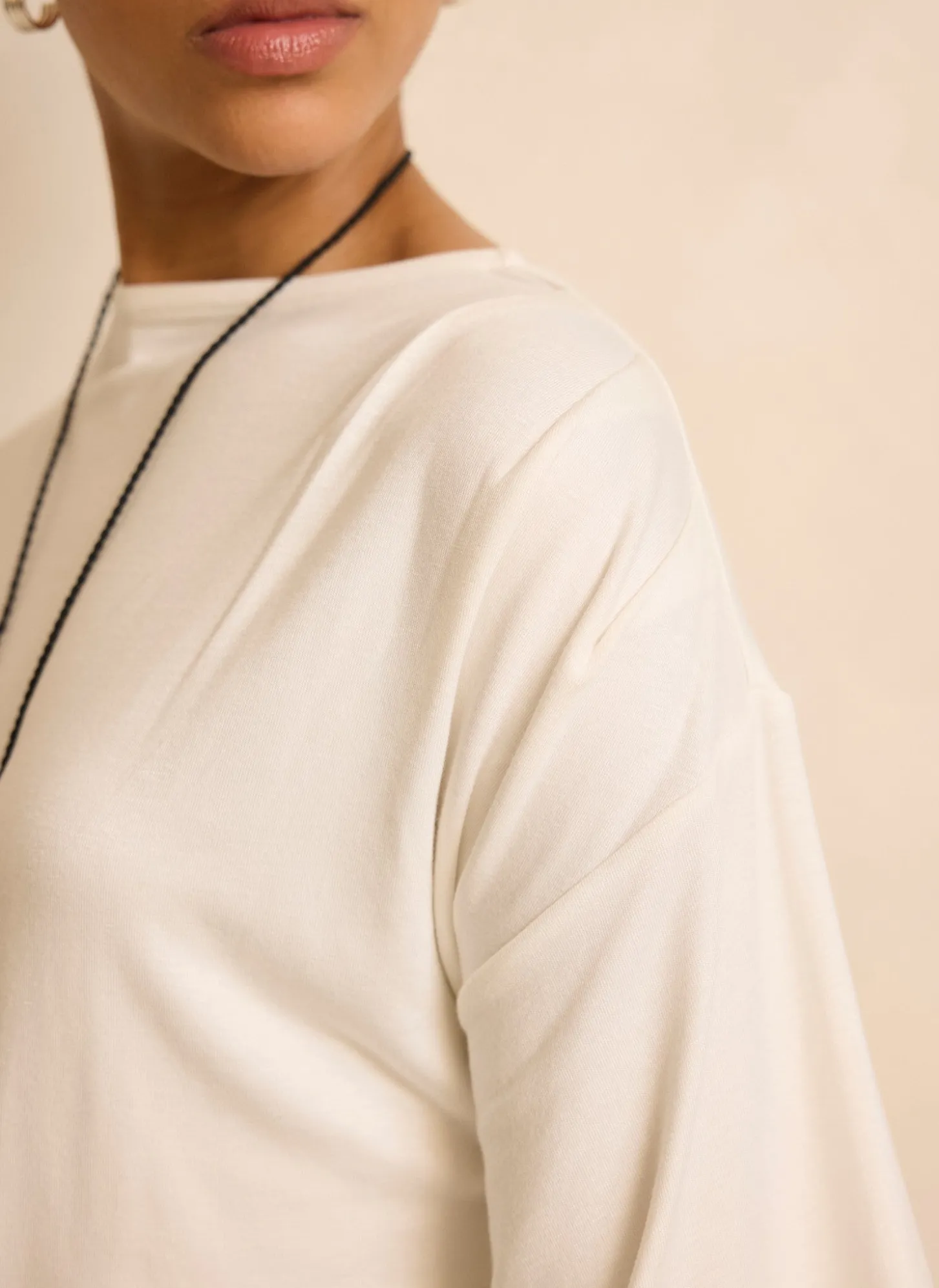 Cream Draped Asymmetric Top